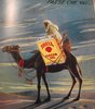 Advertising depicting man on a camel_Le vie italia luglio 1936